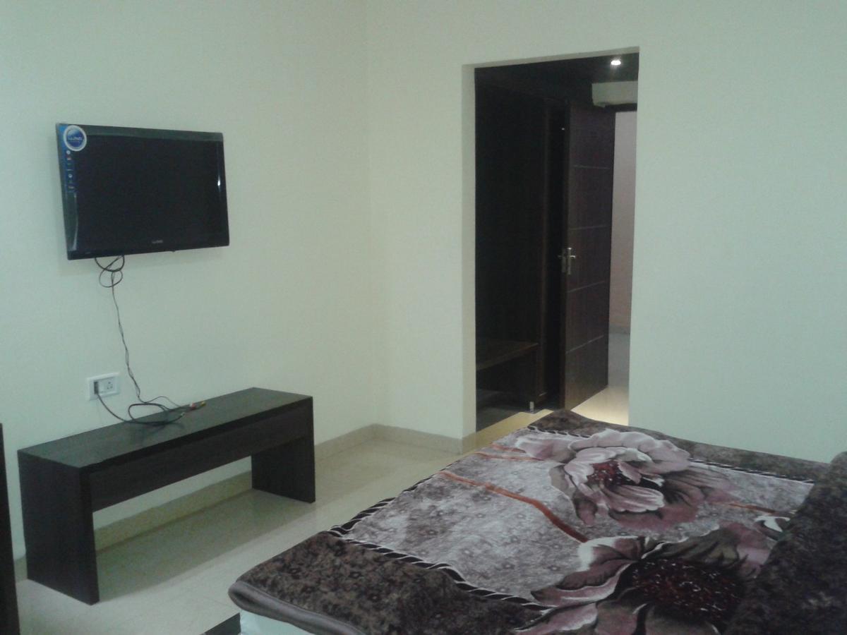 Hotel Milan Palace Amritsar Rum bild